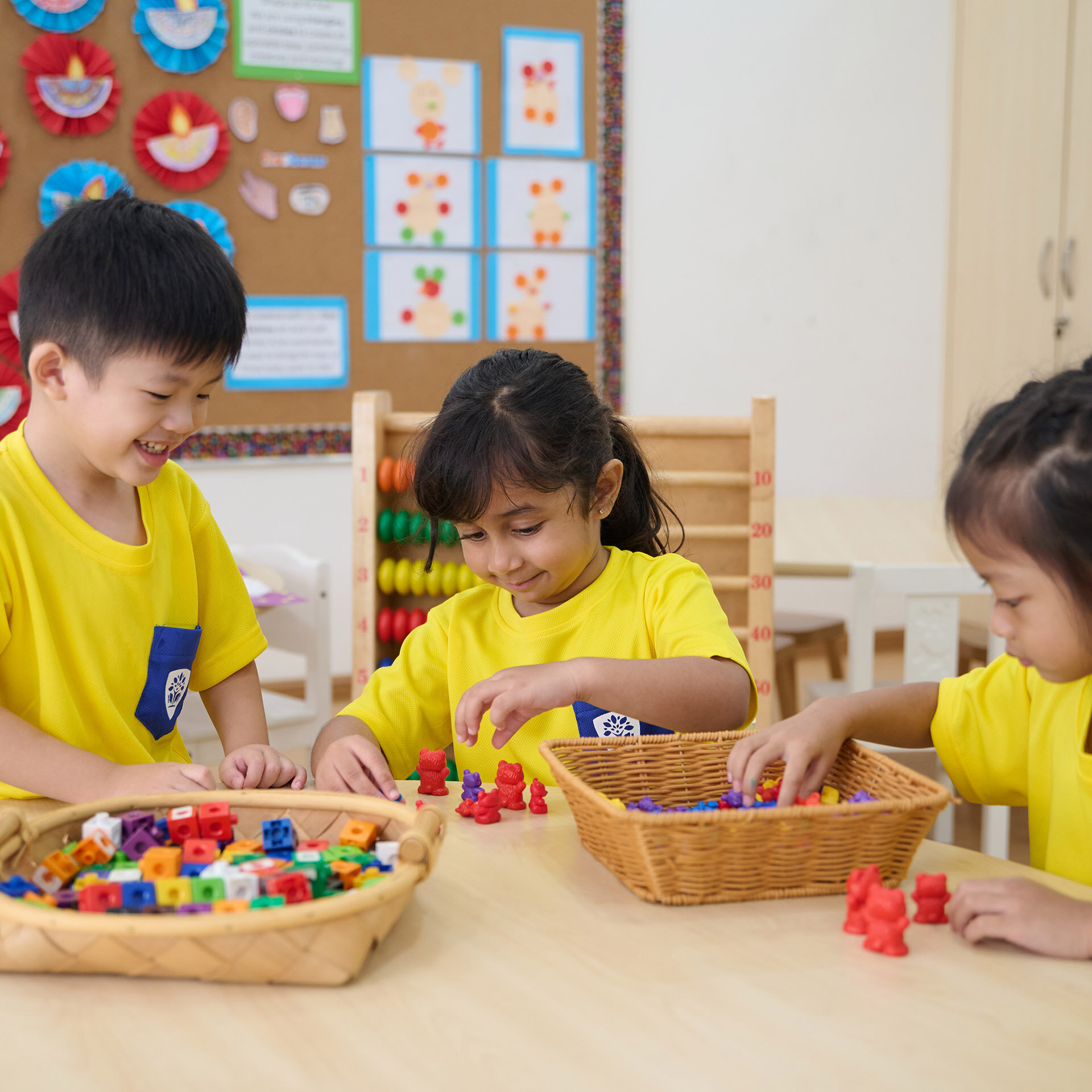 Kids picking toys together