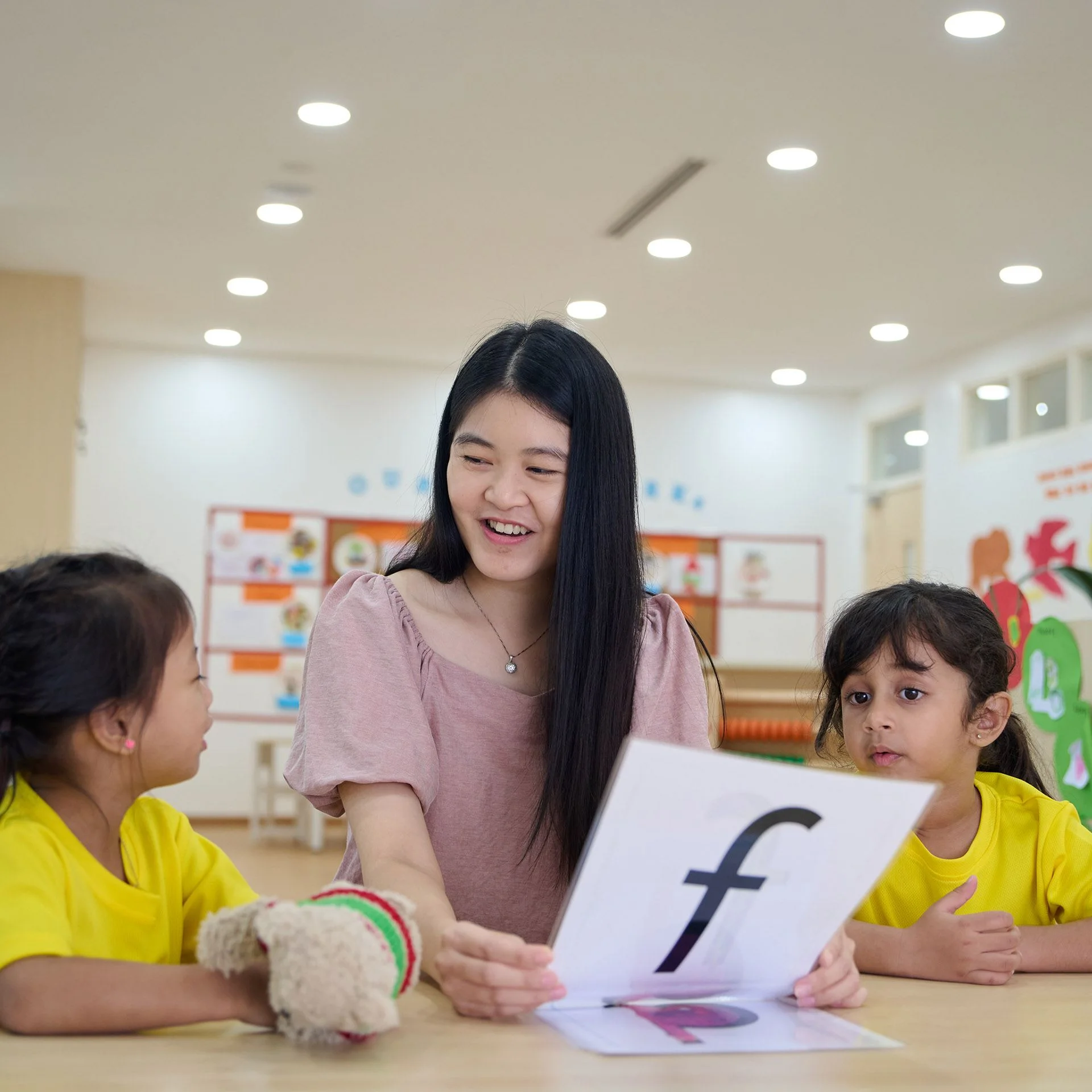 Teacher talking to her kindergarten students
