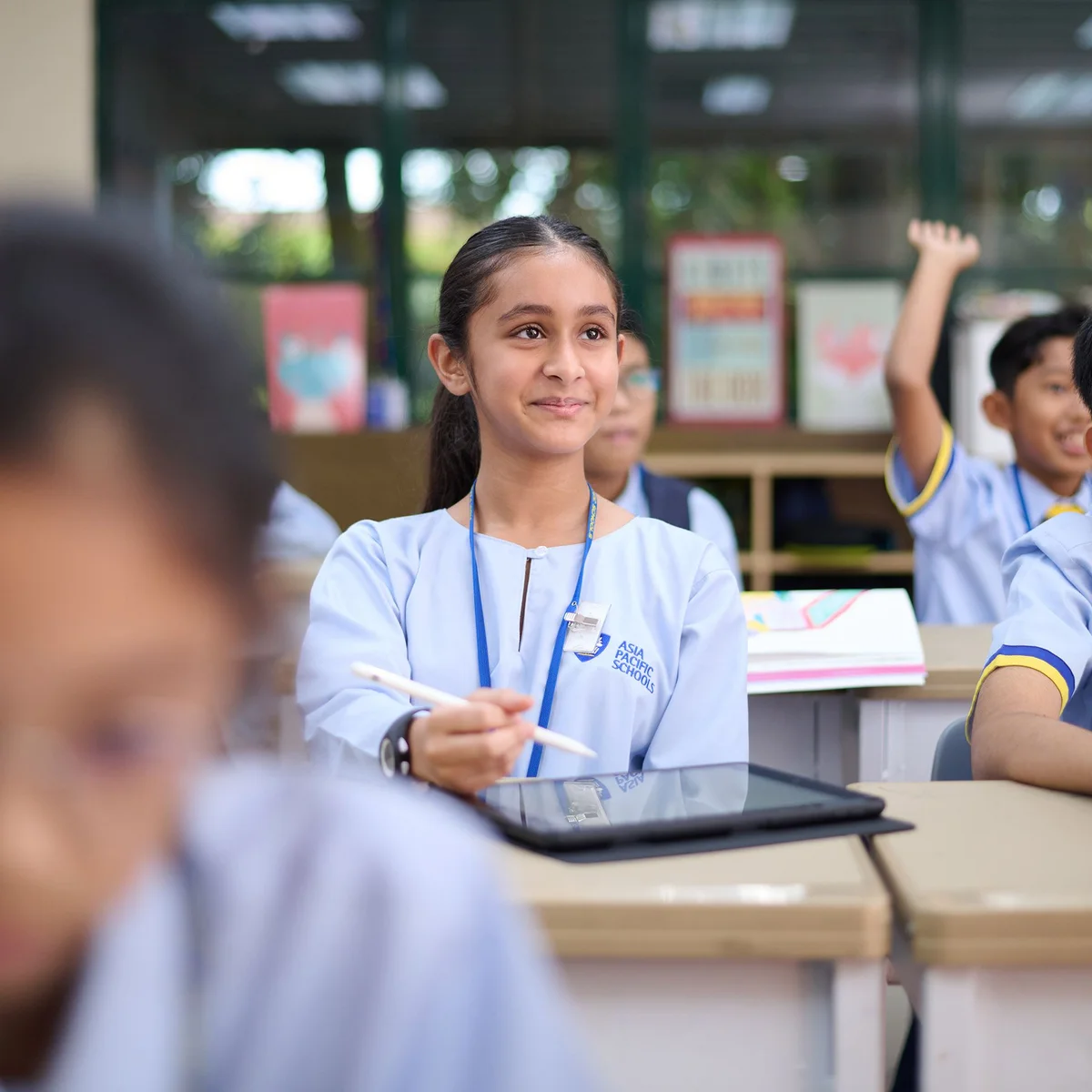Primary school student smiling during a lesson