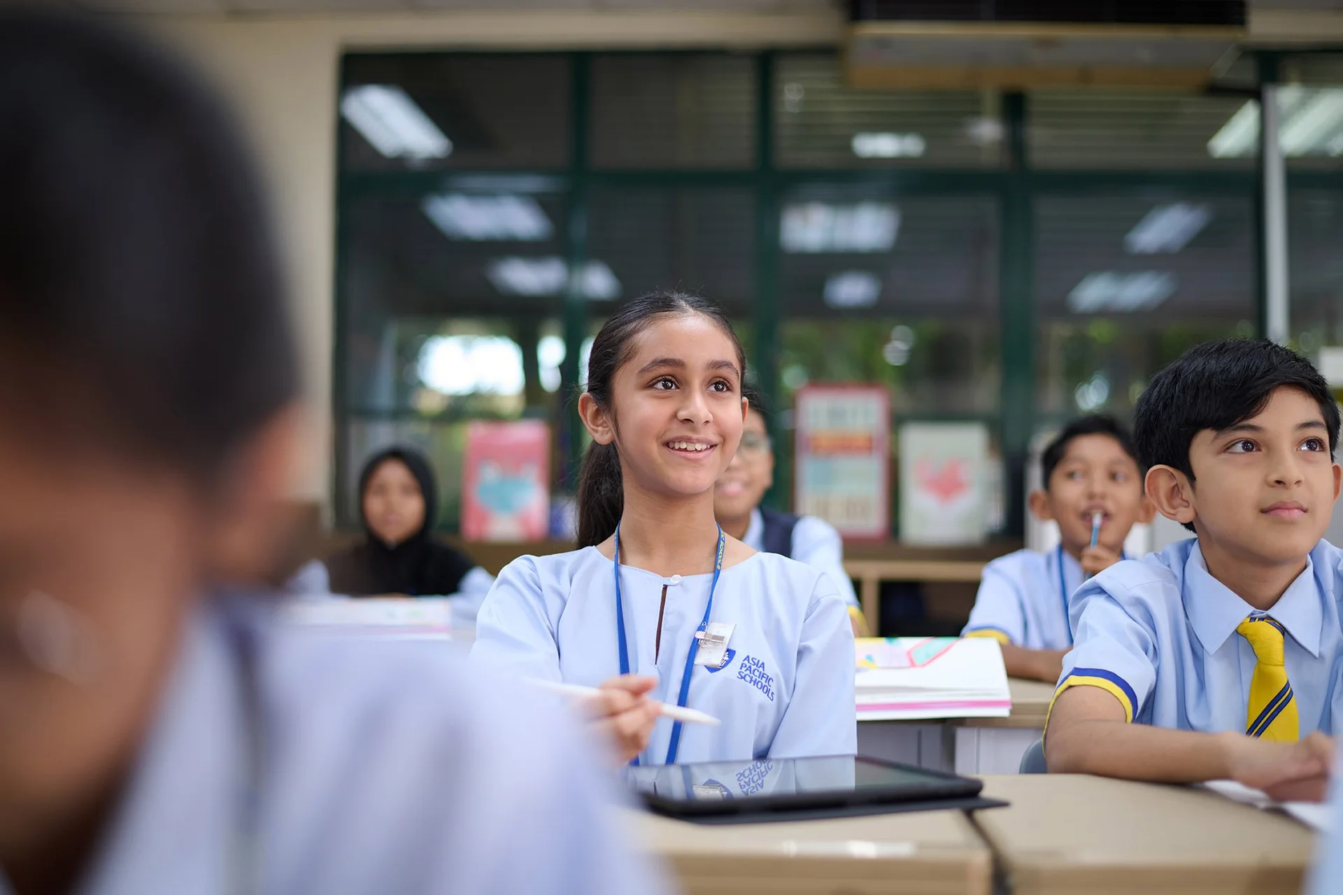 Primary school student smiling during a lesson
