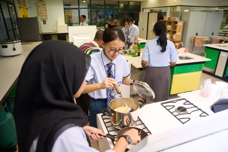Students cooking together