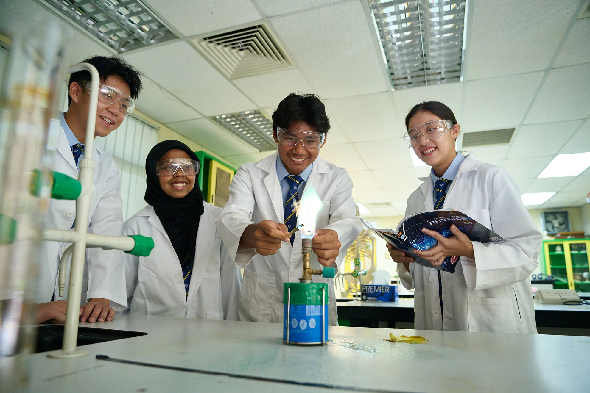Students having fun while doing an experiment in a laboratory