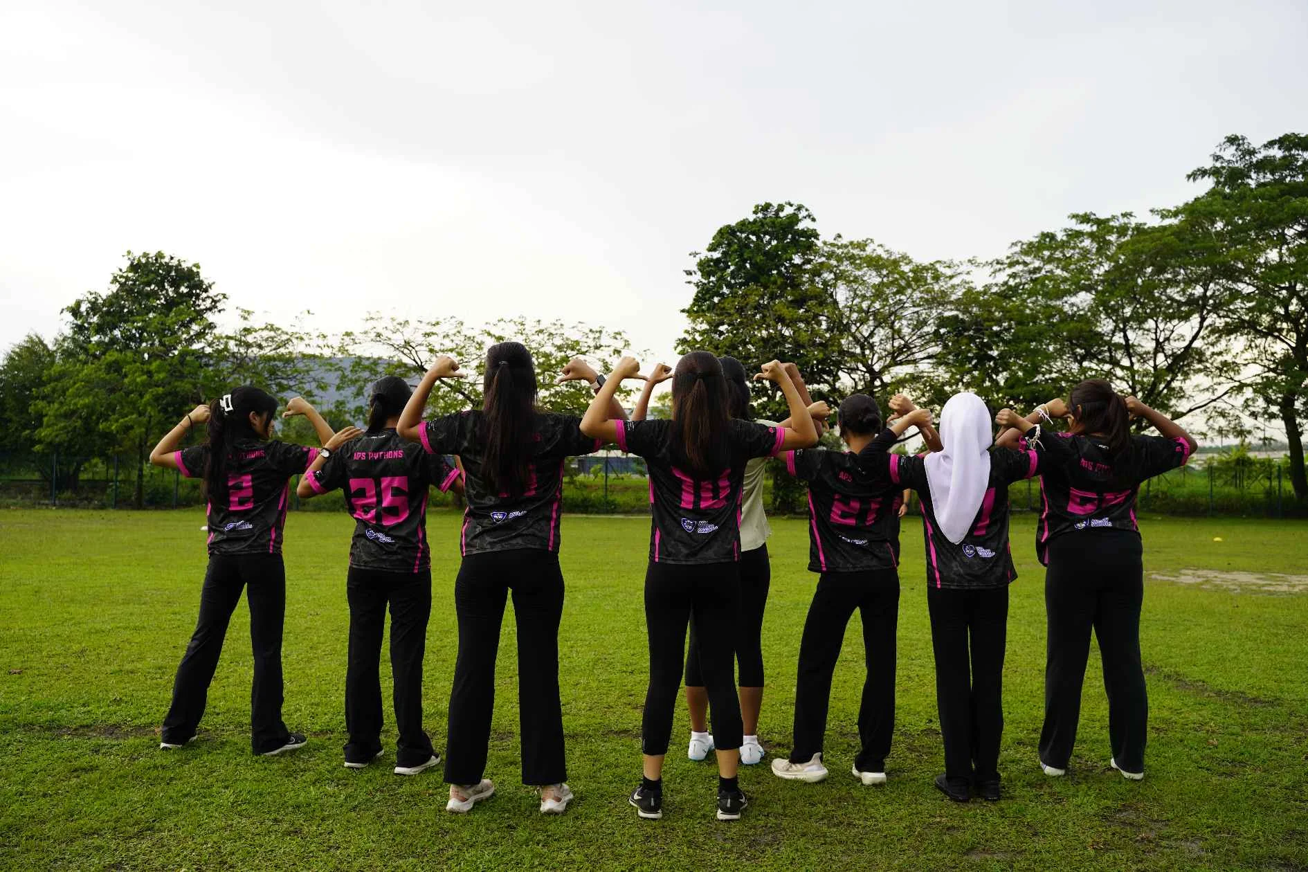 Students wearing their sports club uniform