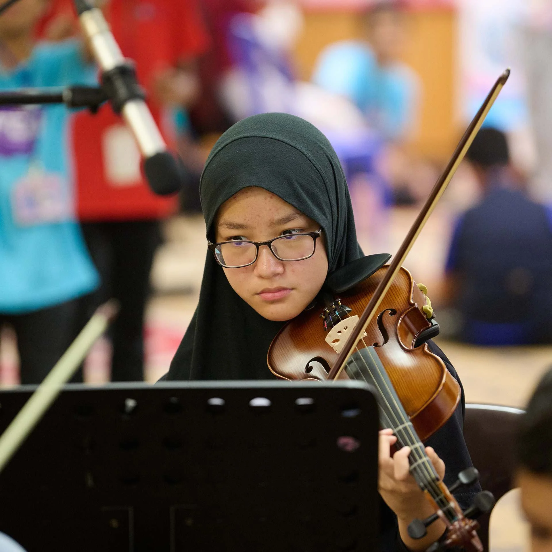 Young student playing a violin
