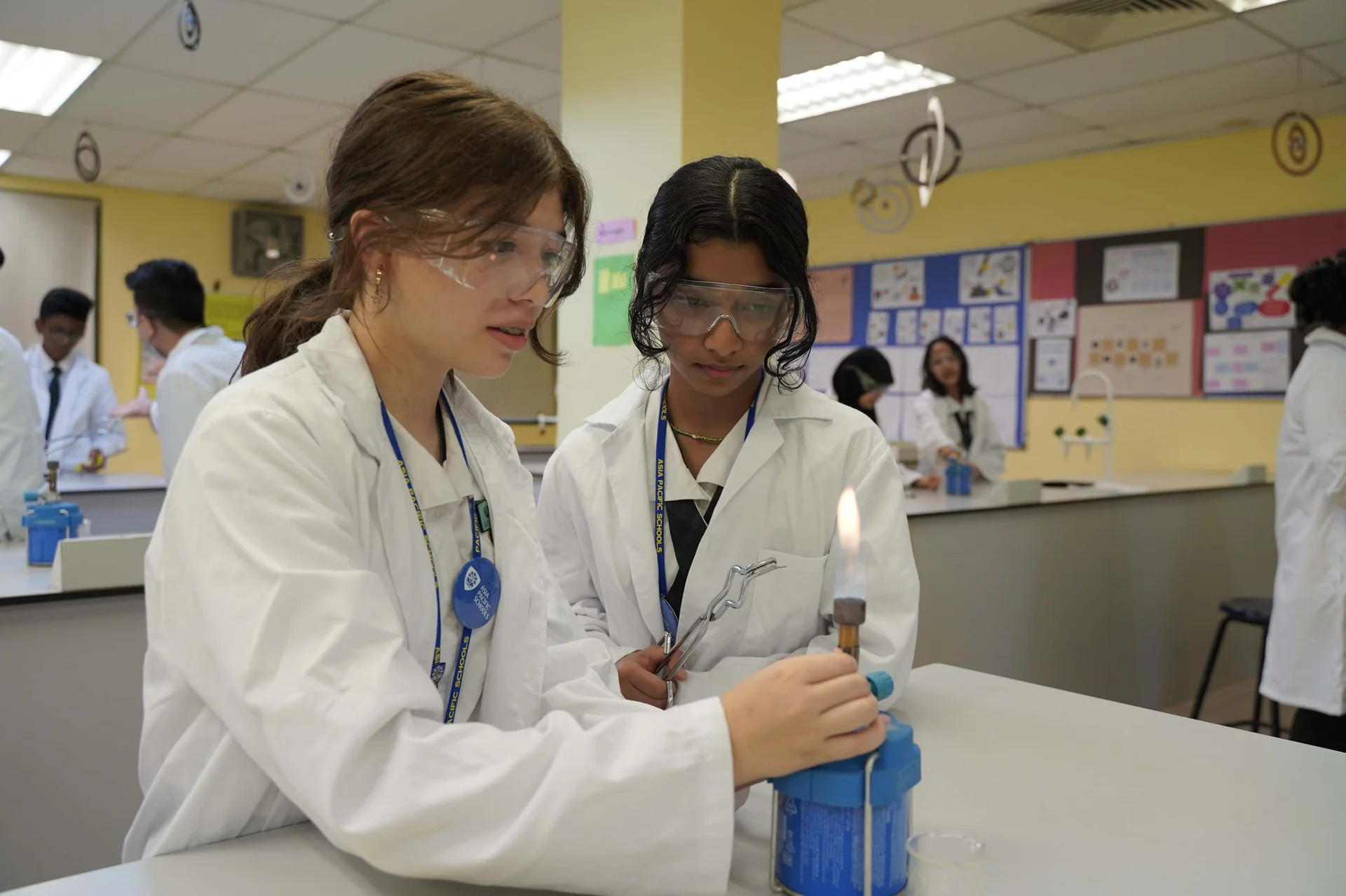 Secondary school students doing a lab experiment