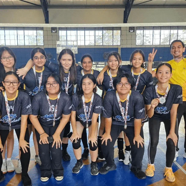 School sports team posing for a picture