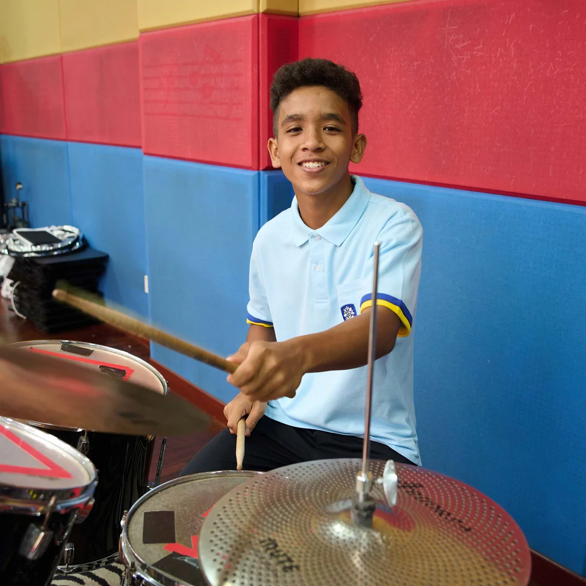 student-playing-drums
